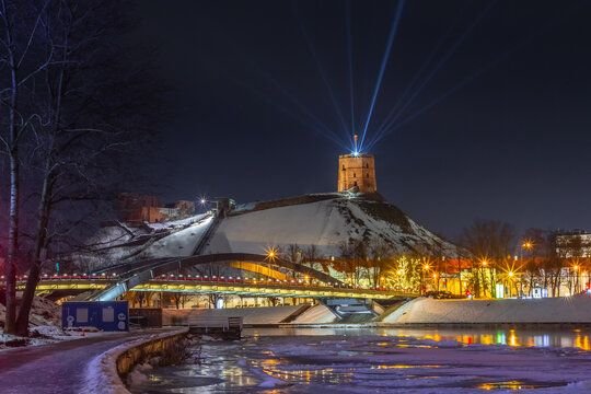 Vilnius, Lithuania - January 25, 2021: Vilnius main symbol, Gediminas castle illuminated for 698 city birthday celebrations - Powered by Adobe
