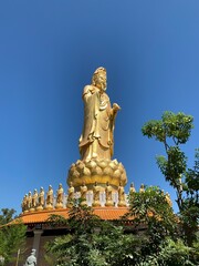 Obraz premium Statue of Guanyin on the territory of Buddhist center.