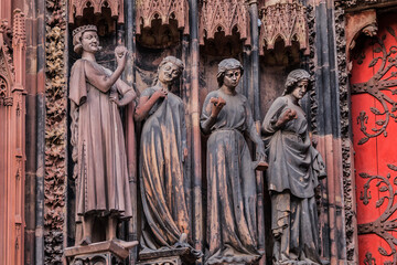 Architectural fragments of Strasbourg Cathedral Main Portal (Cathedral of Our Lady of Strasbourg or Cathedrale Notre-Dame de Strasbourg, 1439) - Roman Catholic cathedral in Strasbourg, Alsace, France.