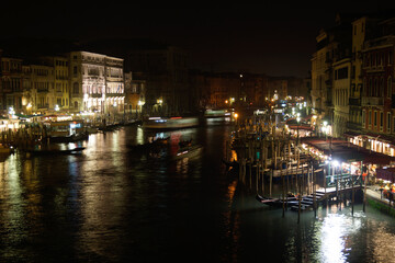 Fototapeta na wymiar Venice (Italy). Berths and restaurants on the Grand Canal in Venice
