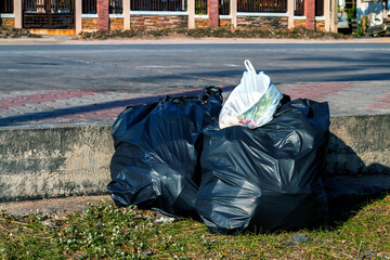 plastic bag of waste on the floor, garbage, trash, pollution, junk