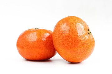 Two mandarines isolated on white background. Delicious healthy fruits