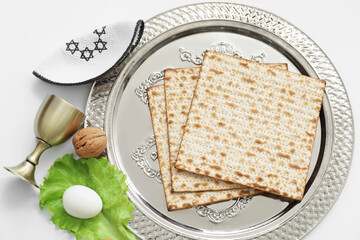 Composition with Passover Seder plate on white background