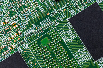 Electronic circuit board close up. Motherboard digital chip. High-tech technology background