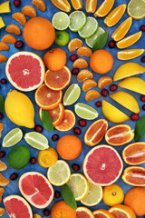 Large collection of high fibre citrus fruit with cranberries, oranges, lemons, limes & grapefruit...