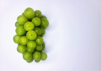 Grapes on the table, white background