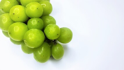 Grapes on the table, white background