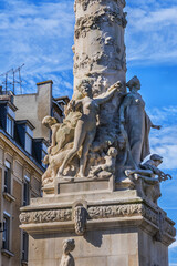 Ancient monumental fountain Sube with golden Angel at top erected in middle of Place d'Erlon, four statues represent Region Rivers: Marne, Vesle, Suippe and Aisne. Reims, Champagne-ardenne, France.
