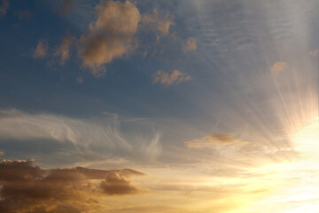 Amazing sunset and warm skies with clouds