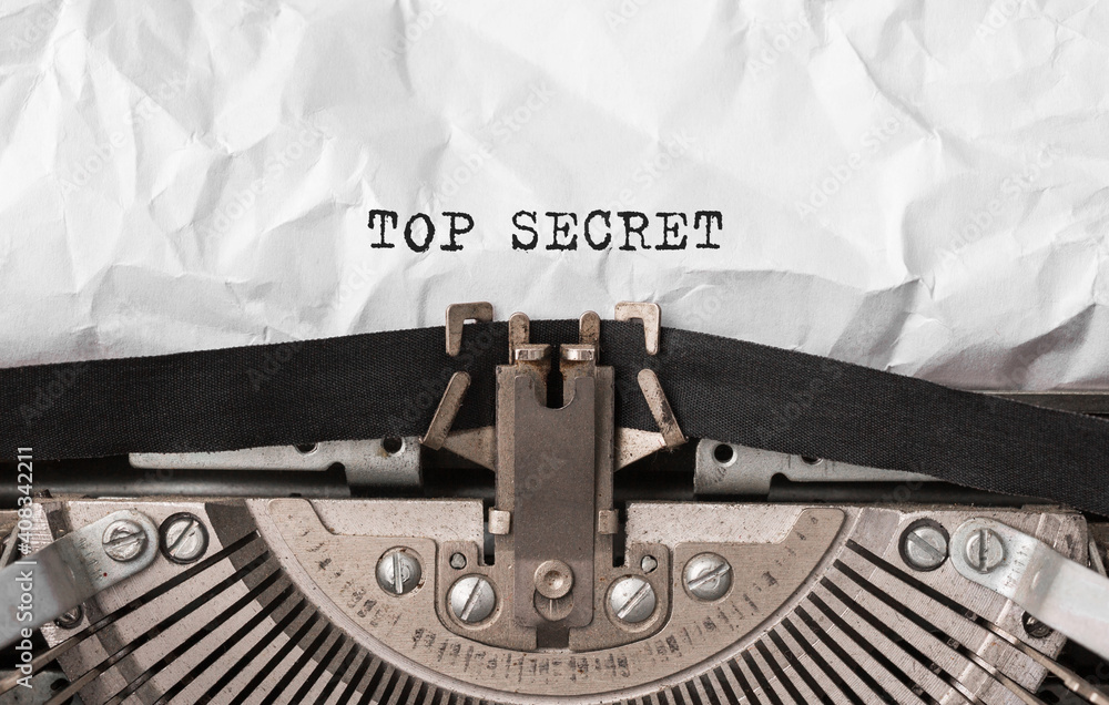 Poster text top secret typed on retro typewriter