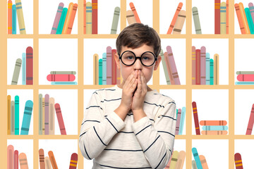 Young funny  boy  in round glasses  puzzled how to read all the books