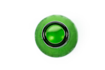 empty green beer bottle on white background, top view