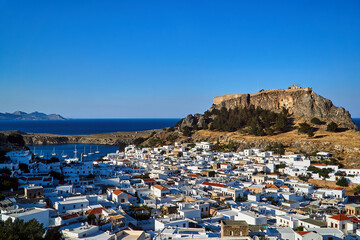 Medieval fortress and white houses of Lindos village in Rhodes