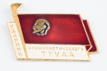 soviet metallic badge on white background