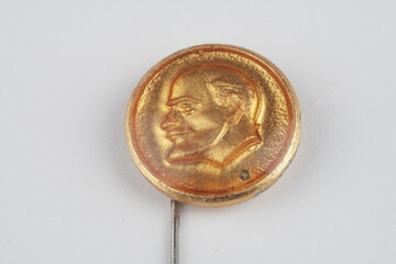 soviet metallic badge on white background