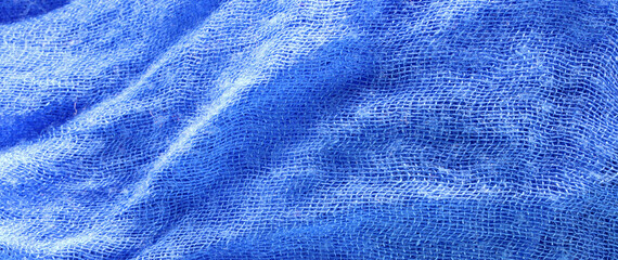 Fototapeta na wymiar close-up of blue fabric texture background