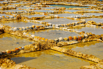 Salt Pans near Marsalforn is scenic spot for seaside salt harvesting in Gozo Maltese Islands