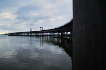 Fototapeta na wymiar metallic pier entering the sea in spain andalusia