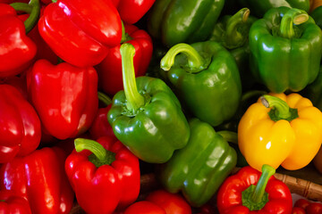 Red green yellow bell pepper background
