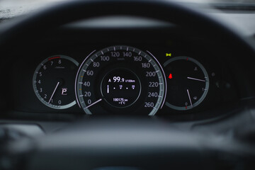 black speedometer in car close up 