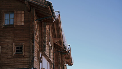 Obraz premium beautiful wood house in alpine architecture in austria