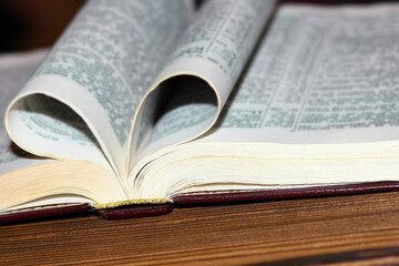 a open book with heart on background