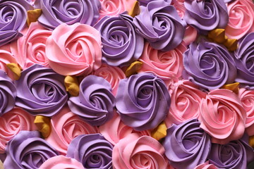 A piece of purple cake on the table black background