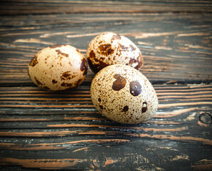 Obraz premium quail eggs on wooden background