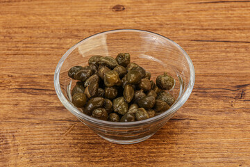 Tasty capers in the bowl