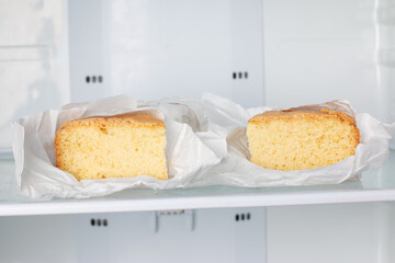 Fresh sponge cake. Frozen sponge cake in the freezer
