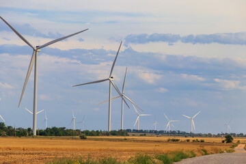 Wind turbines in a field. Renewable energy