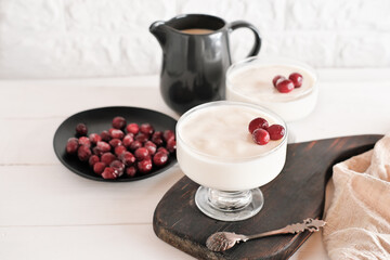 traditional italian panna cotta dessert. homemade panna cotta with garden grown cranberries. frozen...