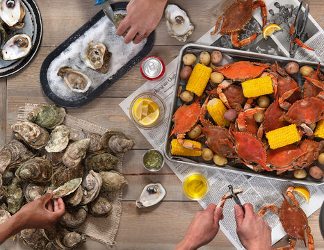 Seafood broil of oysters, crab, corn, potatoes