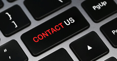 Contact us text on a keyboard. Feedback. Business concept.