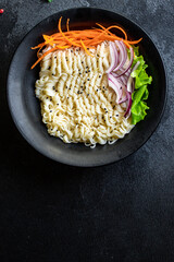 noodles rice or wheat vegetables cellophane pasta no meat vegetarian or vegan on the table for healthy meal snack outdoor top view copy space for text food background image rustic