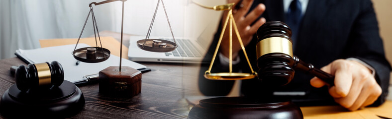Business and lawyers discussing contract papers with brass scale on desk in office. Law, legal...