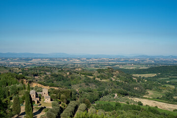 Fototapeta na wymiar Tuscany, Italy - June 18, 2017: View of Tuscany land