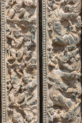 Lakkundi, Karnataka, India - November 6, 2013: Kasivisvesvara Temple. Detail of beige stone detailed sculptures on multi-frame around entrance.