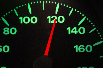 speedometer of a car at 120 km/ h very close view