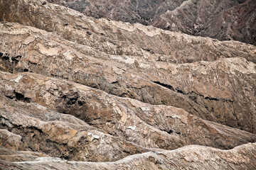 Solidified lava texture. Hills of volcanic origin. Abstract natural background. Surface of the...
