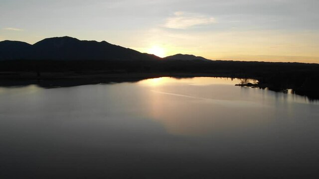 Staffelsee lake in Germany Bavaria recorded in the afternoon twilight flying over the lake with a DJI drone in 4k with ND filters