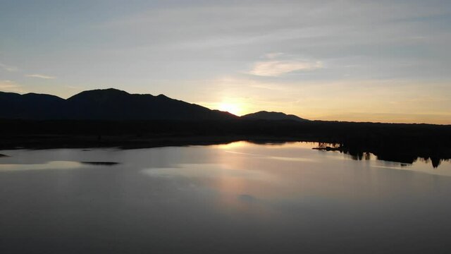 Staffelsee lake in Germany Bavaria recorded in the afternoon twilight flying over the lake with a DJI drone in 4k with ND filters