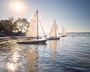 Sailboats on lake Balaton in sunset