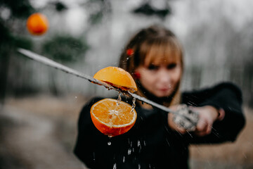 ninja girl cuts pineapple, katana ninja cuts fruit, kill bill, fruit ninja © VaVu 