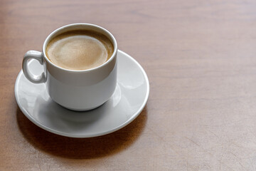 a cup of freshly brewed aromatic coffee