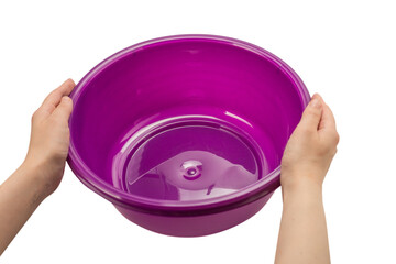 Purple hand basin in woman hands.
