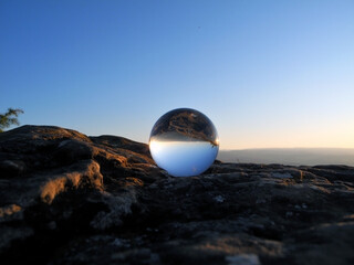 Sunset in a glass ball on top of the Olympic complex in the city of Kislovodsk