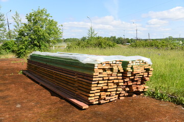 wooden planks are prepared for construction