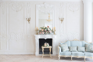 luxurious light interior in the Baroque style. A spacious room with a road chic beautiful...
