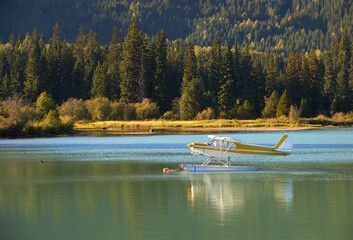 Remote Mountain Lake Floatplane. A float plane on a remote mountain lake.

